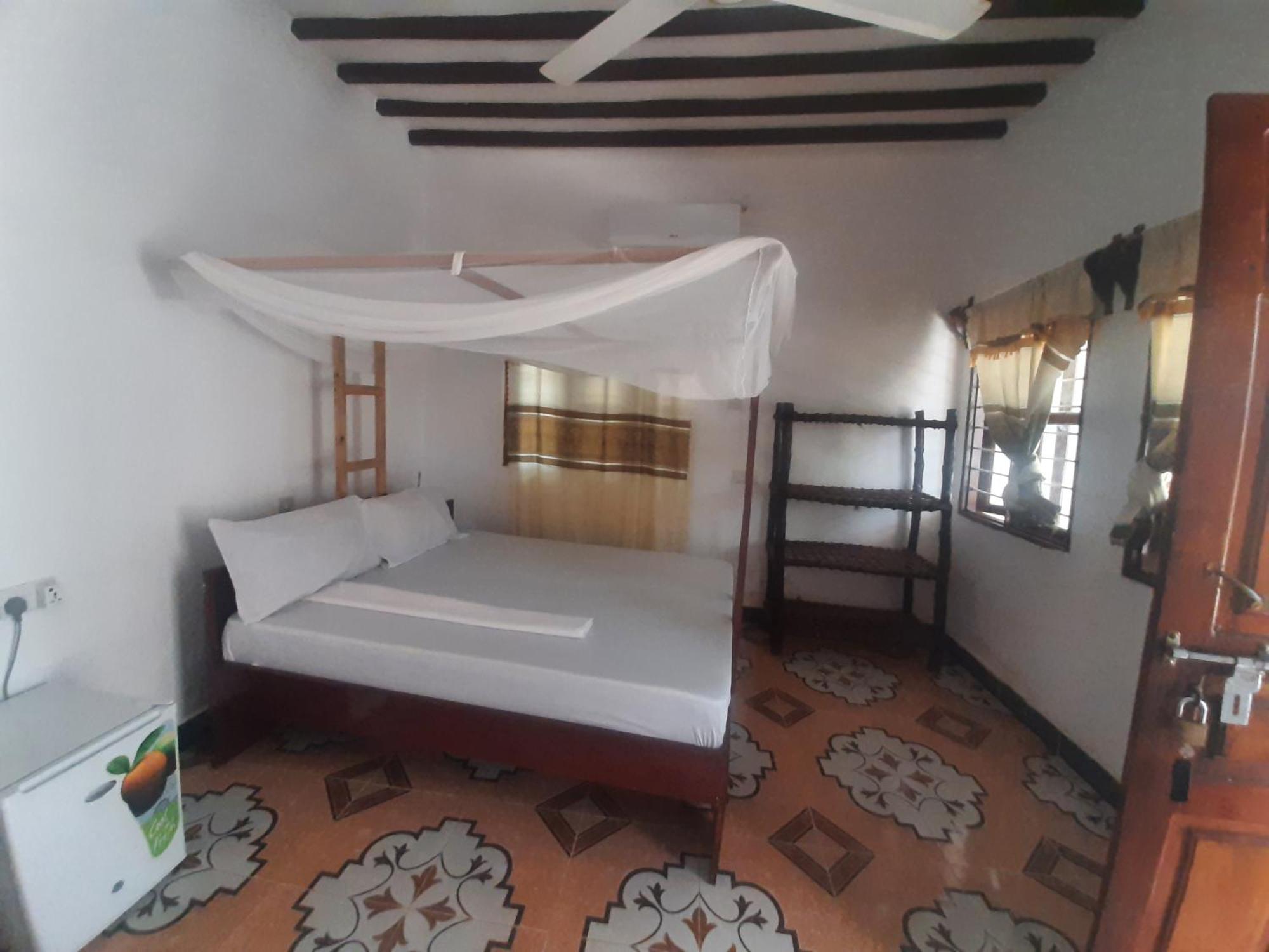 Ames Nungwi Bed & Breakfast Rom bilde