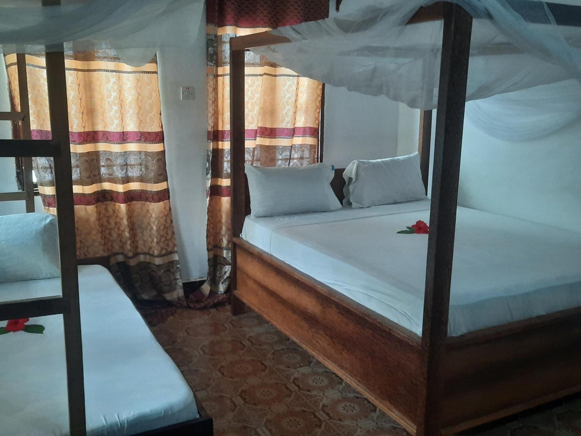 Ames Nungwi Bed & Breakfast Rom bilde